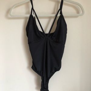Black crisscrossed bodysuit